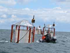 Floating off-shore mesocosm experiment for studying open acidification on planktonic ecosystem