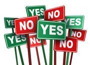 Signs in green and red saying yes and no on