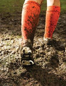 Muddy football socks