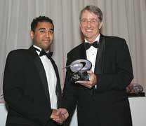 Vijay Chudasama (left) receives the 3M Award for the best Chemistry Student from Doug Mitchell