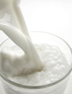 Milk being poured into a glass