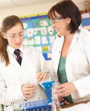 Teacher and students working together in a classroom