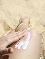 Rubbing in sunscreen