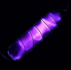 Nitrogen - a glow is given off by ionized nitrogen in a gas discharge tube