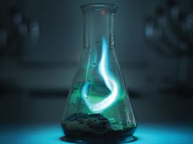 Green/blue flame in a conical flask