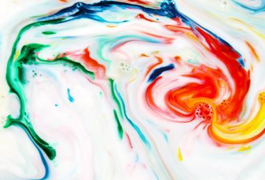 Picture of swirling patterns of food colouring in milk