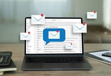 A laptop receiving emails