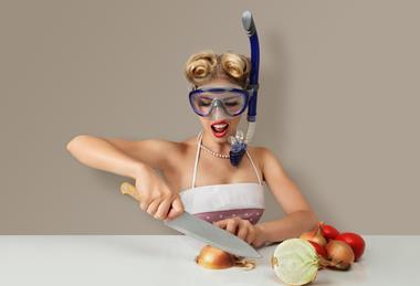 Wearing a mask and snorkel to chop onions