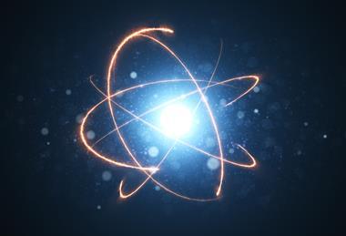 A conceptual illustration of an atom, showing electrons orbiting around a nucleus against a dark background