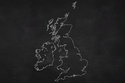 A map of the UK and Ireland in chalk on a blackboard