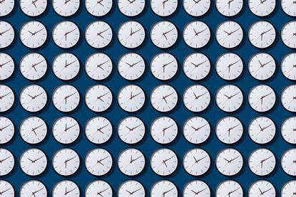 Rows and rows of identical clock faces showing different times