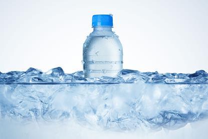 A bottle of liquid water in ice