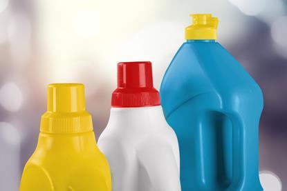 The tops of three different plastic bottles containing bleach and other household chemicals