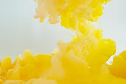 An image of a yellow substance dissolving and diffusing in a clear liquid