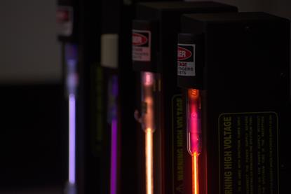 A photograph of glass emission tubes containing air, nitrogen, helium and neon, used for producing atomic emission spectra