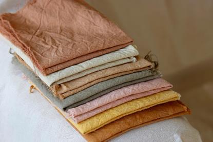 Several fabrics that have been dyed different colours