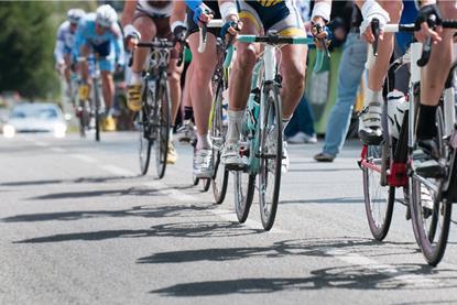 cyclists-group-bicycle-race-shutterstock_100176515