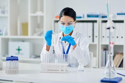 Woman in a lab conducting a research experiment