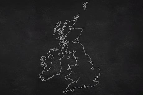 A map of the UK and Ireland in chalk on a blackboard
