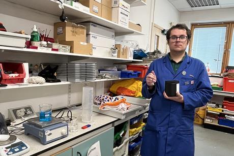 David Robinson in his preparation room with lab supplies