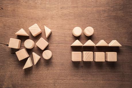 A selection of different shaped pieces of wood on a table