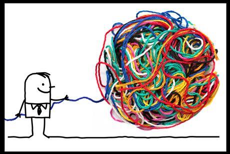 An image showing a cartoon figure untangling a ball of messy colourful wool
