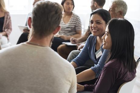 Picture of people talking in groups