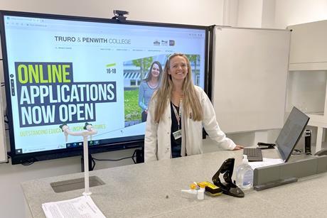 A science teacher in her school lab