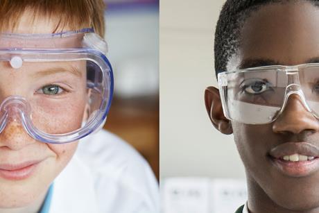 High school students wearing safety goggles and safety glasses
