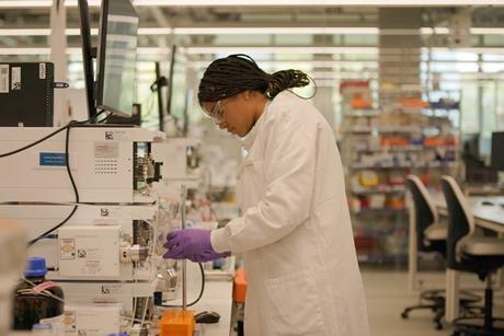 Christina Dumitriu in a laboratory.