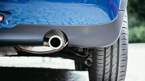 A photo of a car's exhaust pipe