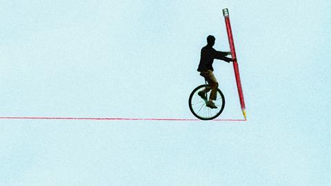 An illustration showing a silhouette man on an unicycle, balancing using a giant pencil