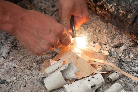 Starting a fire with a ferro rod
