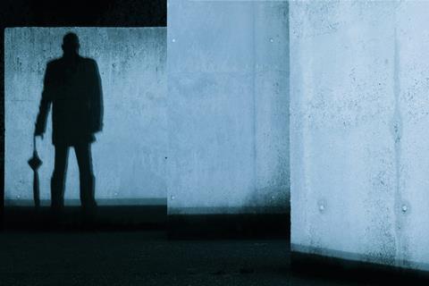 A eerie image showing the silhouette of a man
