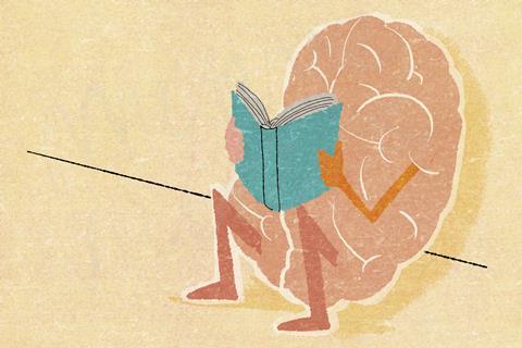 An illustration of a brain reading a book