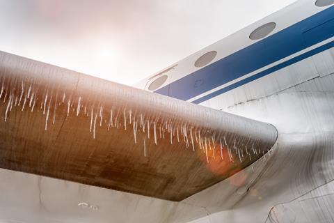 Icicles hanging from a airplane's wing