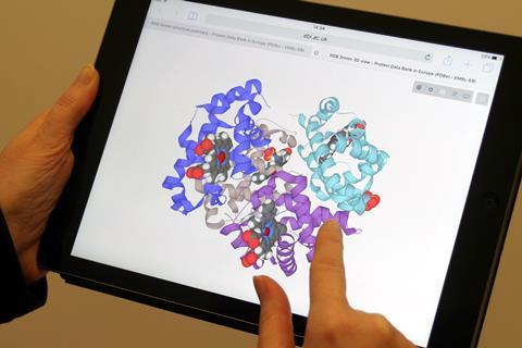 Screenshot of a person using the LiteMol app on iPad