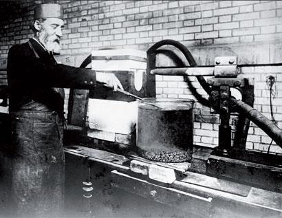 Henri Moissan working in his laboratory