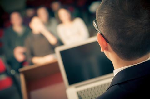 Man standing in front of class