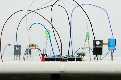 Electronic components connected by wires