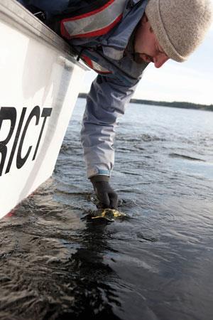 Sampling water from a boat