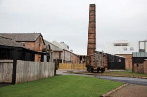 The restored blacksmiths, salt wagon and pump house