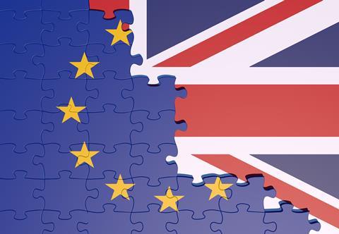 Jigsaw puzzle pieces showing half the EU flag merging into half of the Union flag shutterstock 1151373788