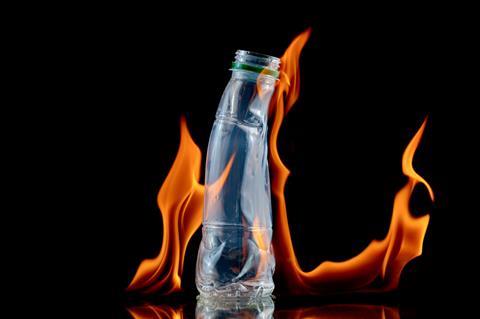 A plastic bottle with fire