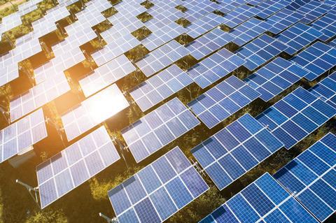 Top view of solar panels in a solar farm