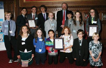 The winners receive their prizes and certificates from Bill Bryson