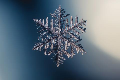 A close up image of a snowflake