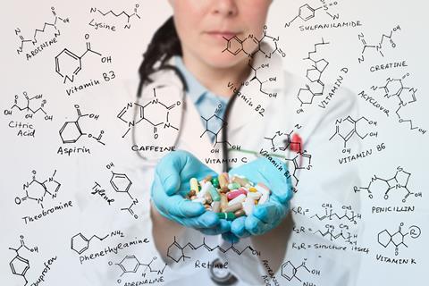 An image of a dietician surrounding by formulae of vitamins and food additives