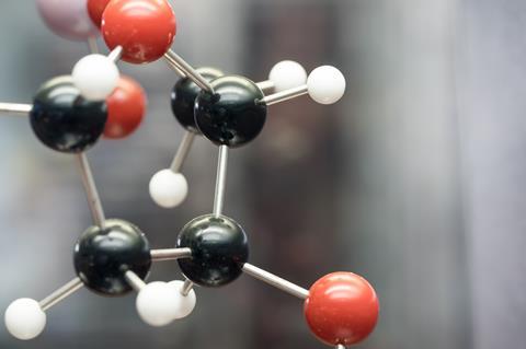 A close up of a molecule showing carbon, oxygen and hydrogen