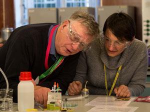 Two people with scientific equipment